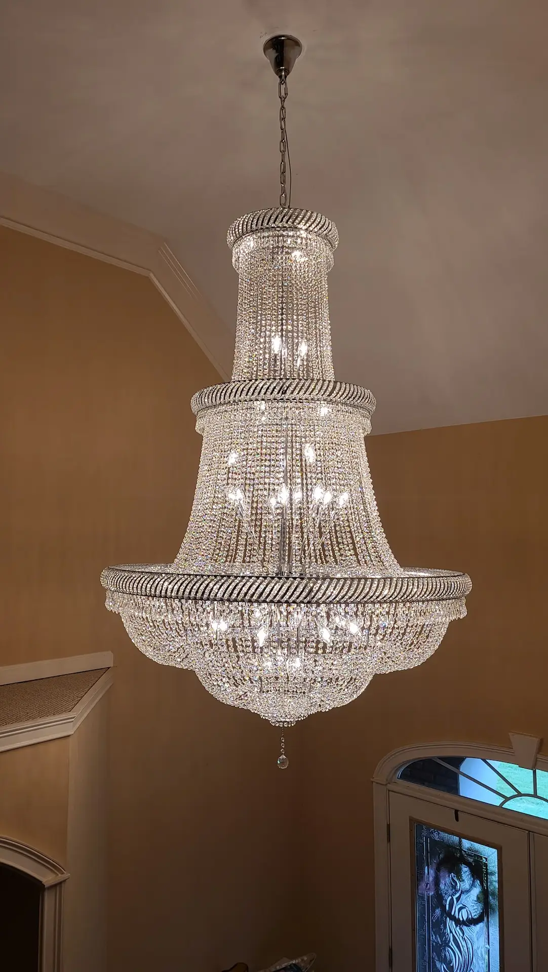 crystal chandelier in a foyer fully assembled