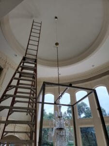 chandelier lift with Large crystal chandelier in 2 story livingroom