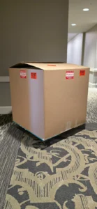 large chandelier box for storage with Fragile labels